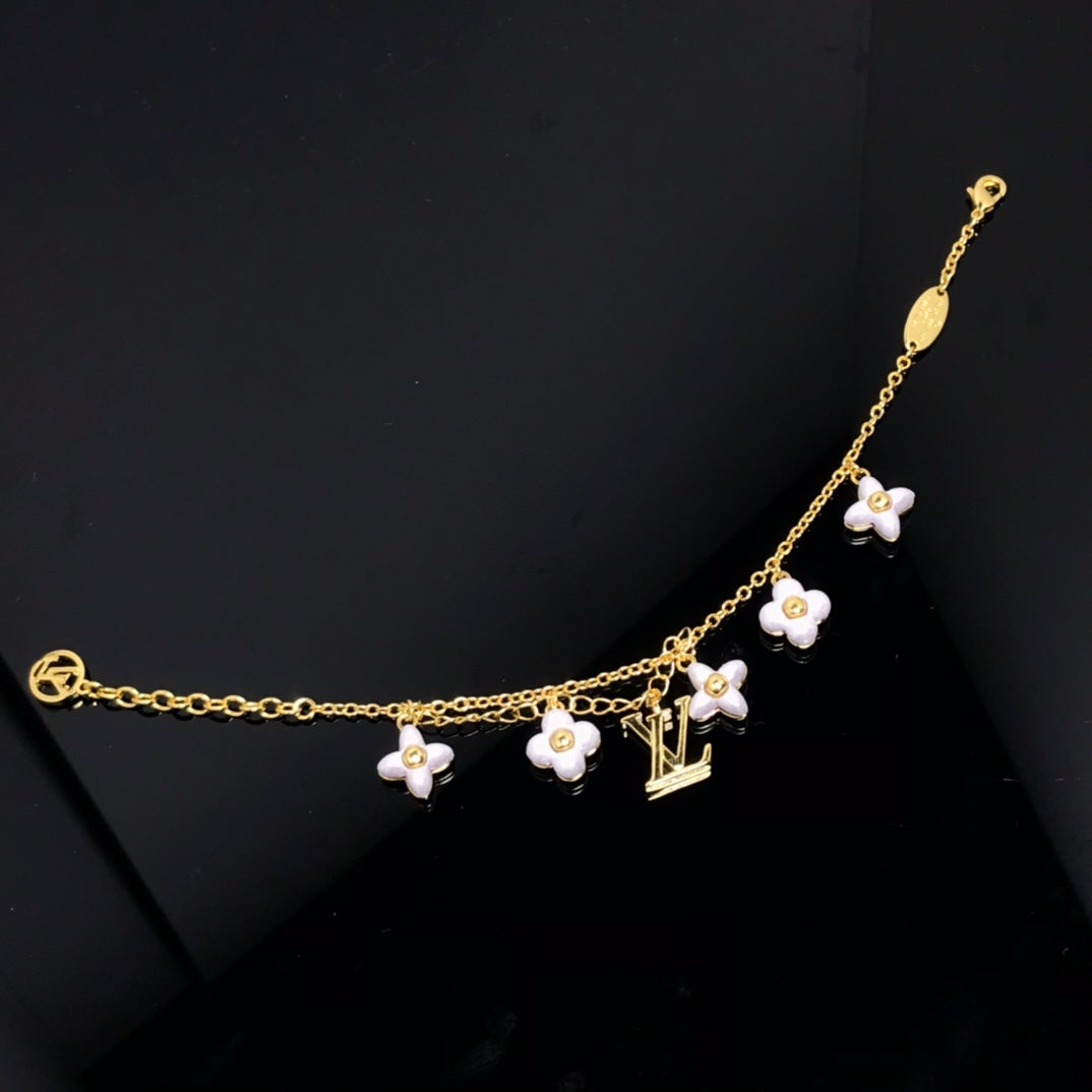 [Rosla]LOGO 6 MOTIF STAR AND SUN GOLD BRACELET
