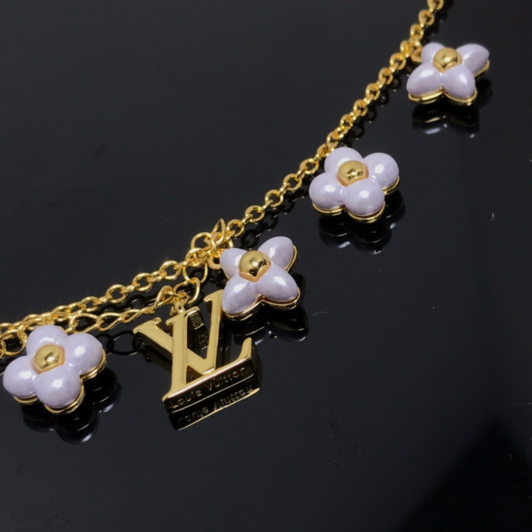 [Rosla]LOGO 6 MOTIF STAR AND SUN GOLD BRACELET