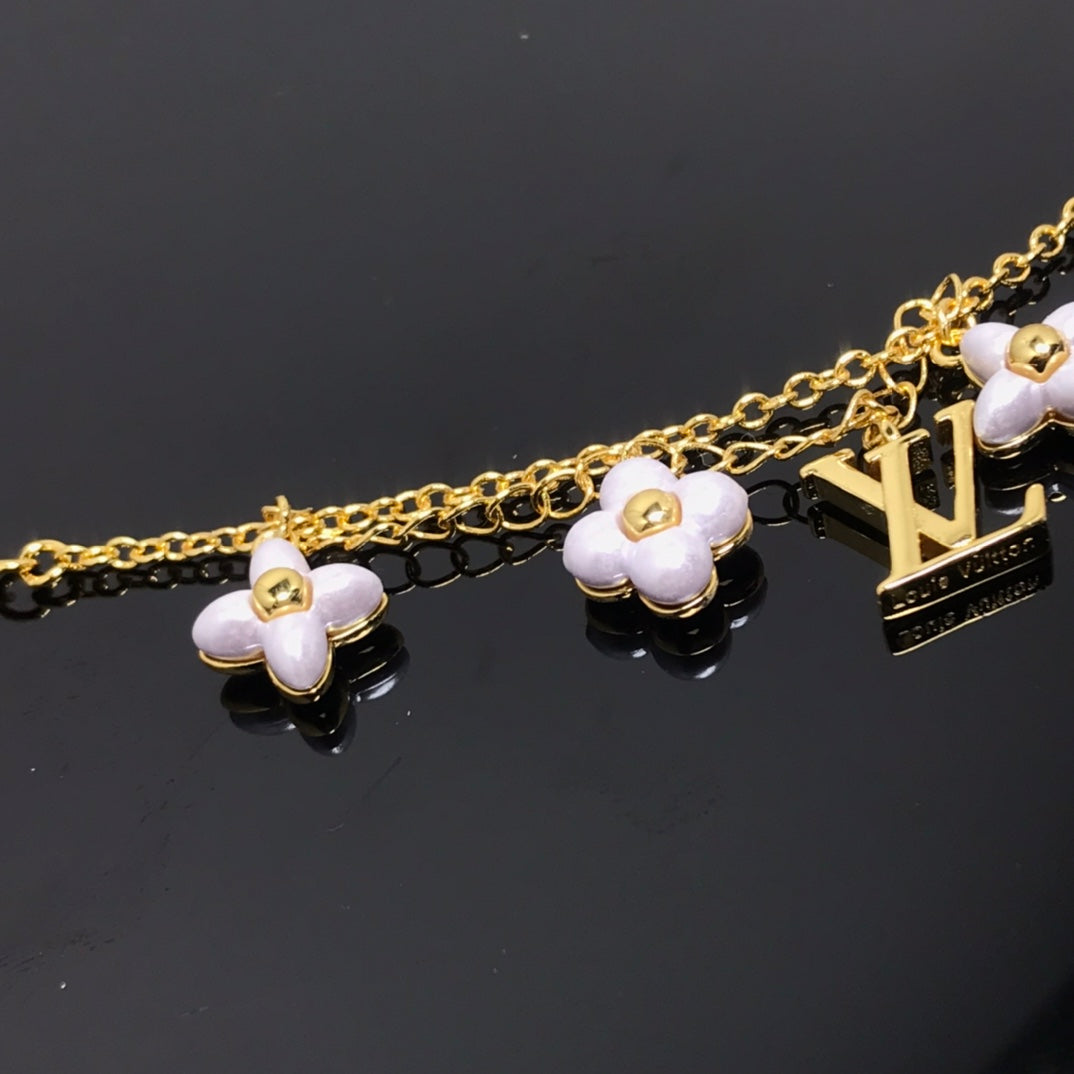 [Rosla]LOGO 6 MOTIF STAR AND SUN GOLD BRACELET
